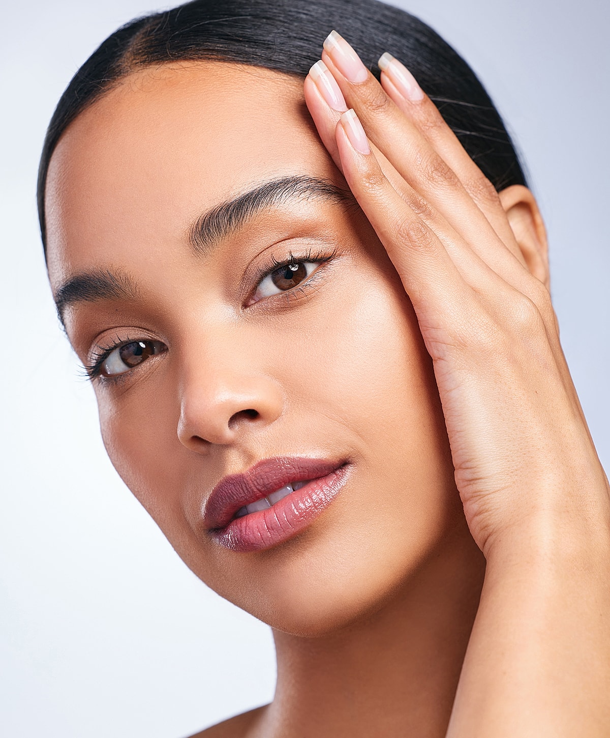 Close-up of a woman's radiant face.