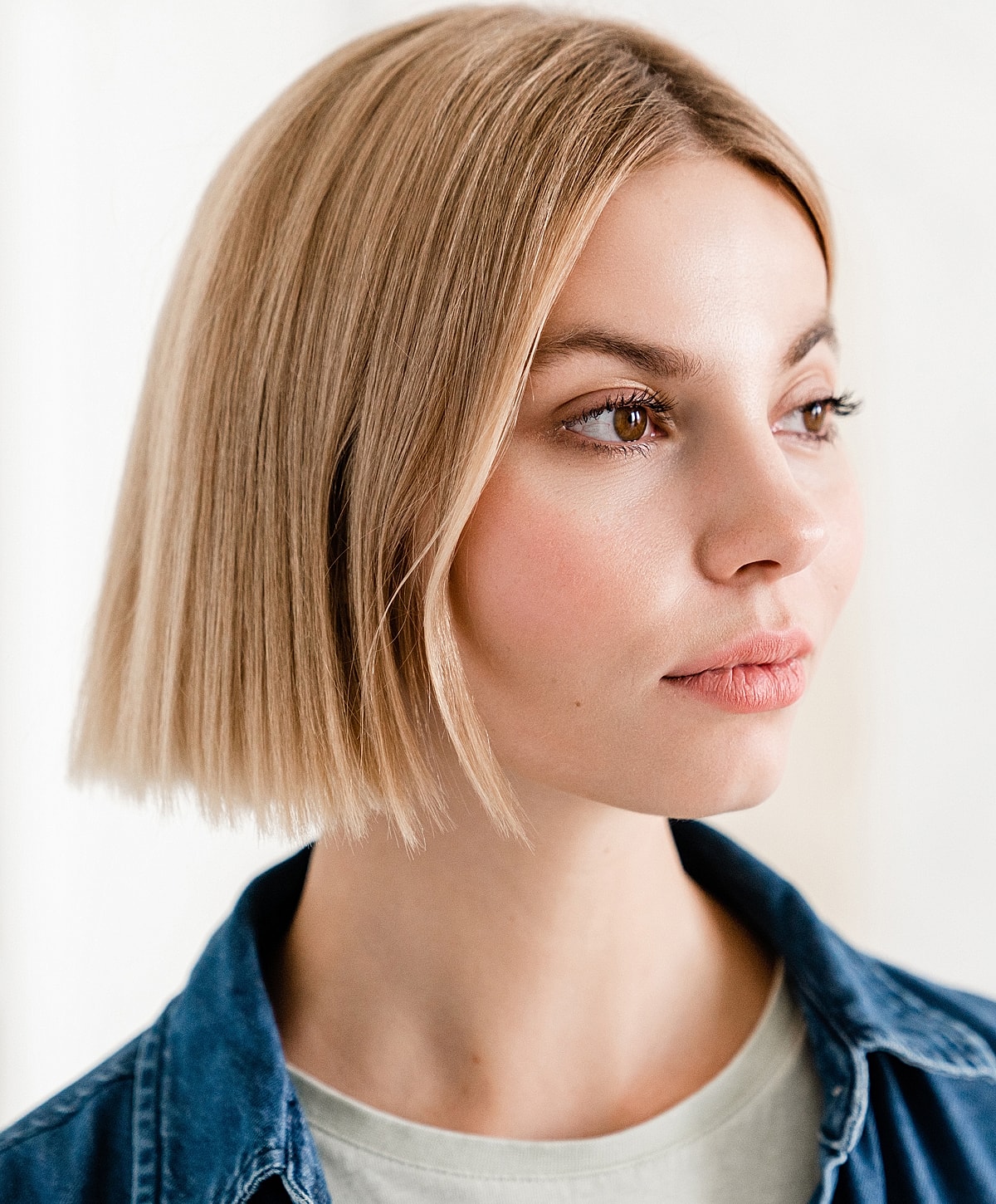 Young woman with blonde bob hairstyle portrait.