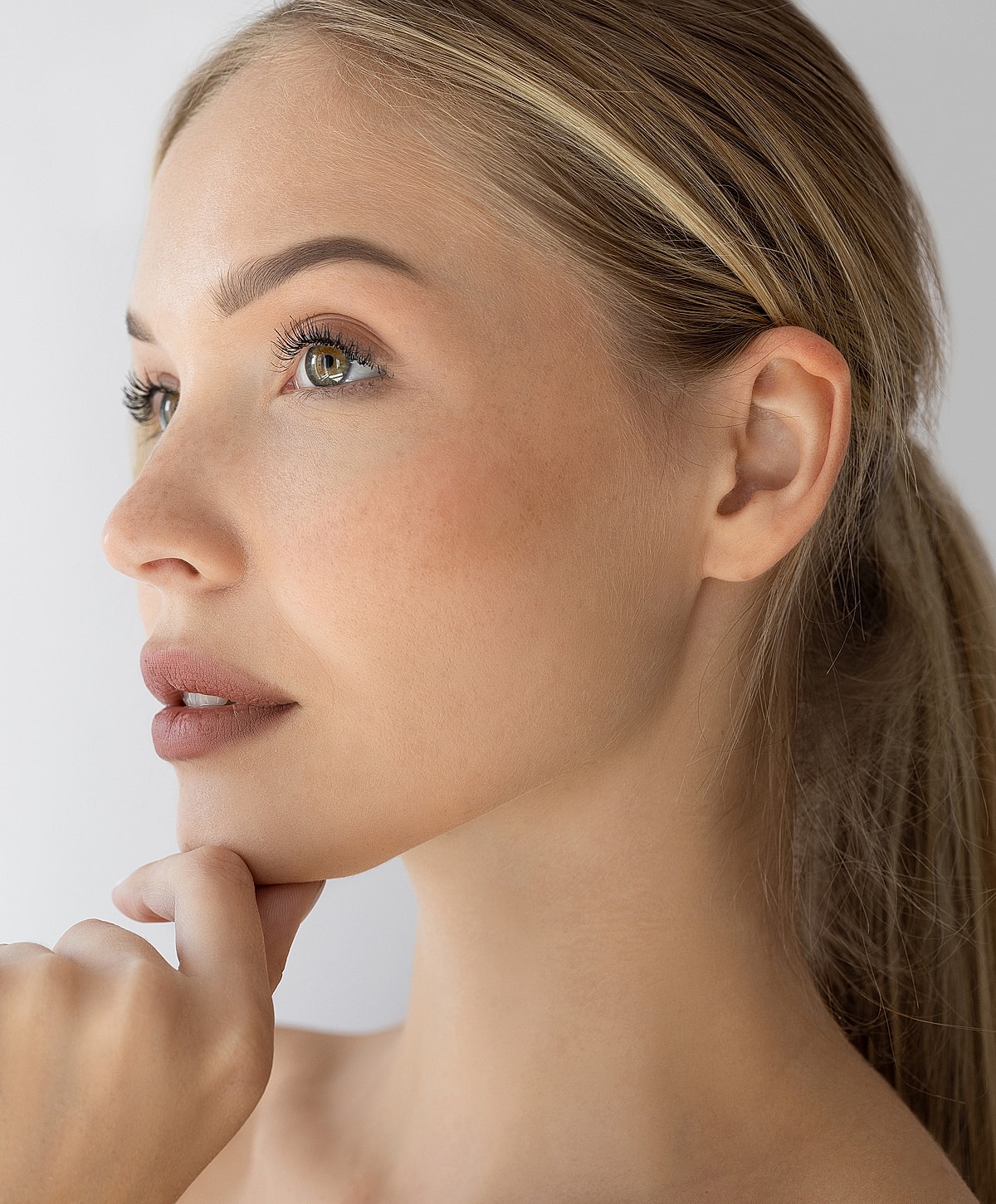 Profile of a woman with thoughtful expression.