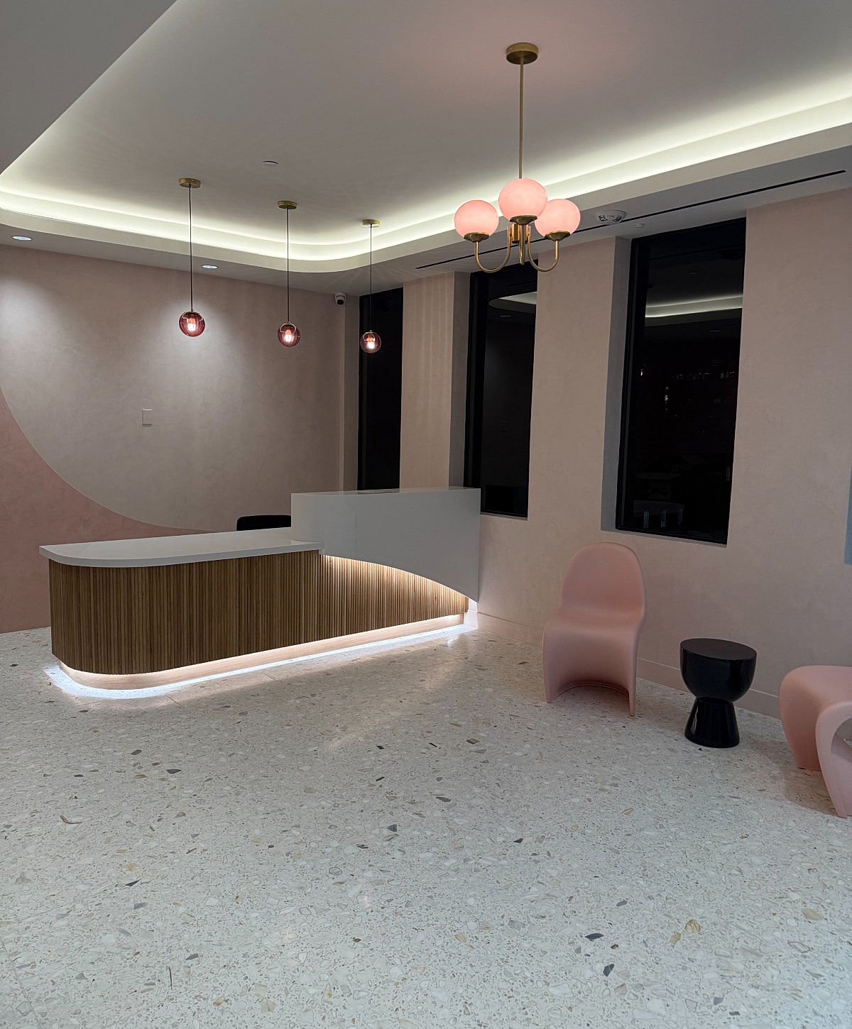 Modern waiting area with stylish décor and lighting.
